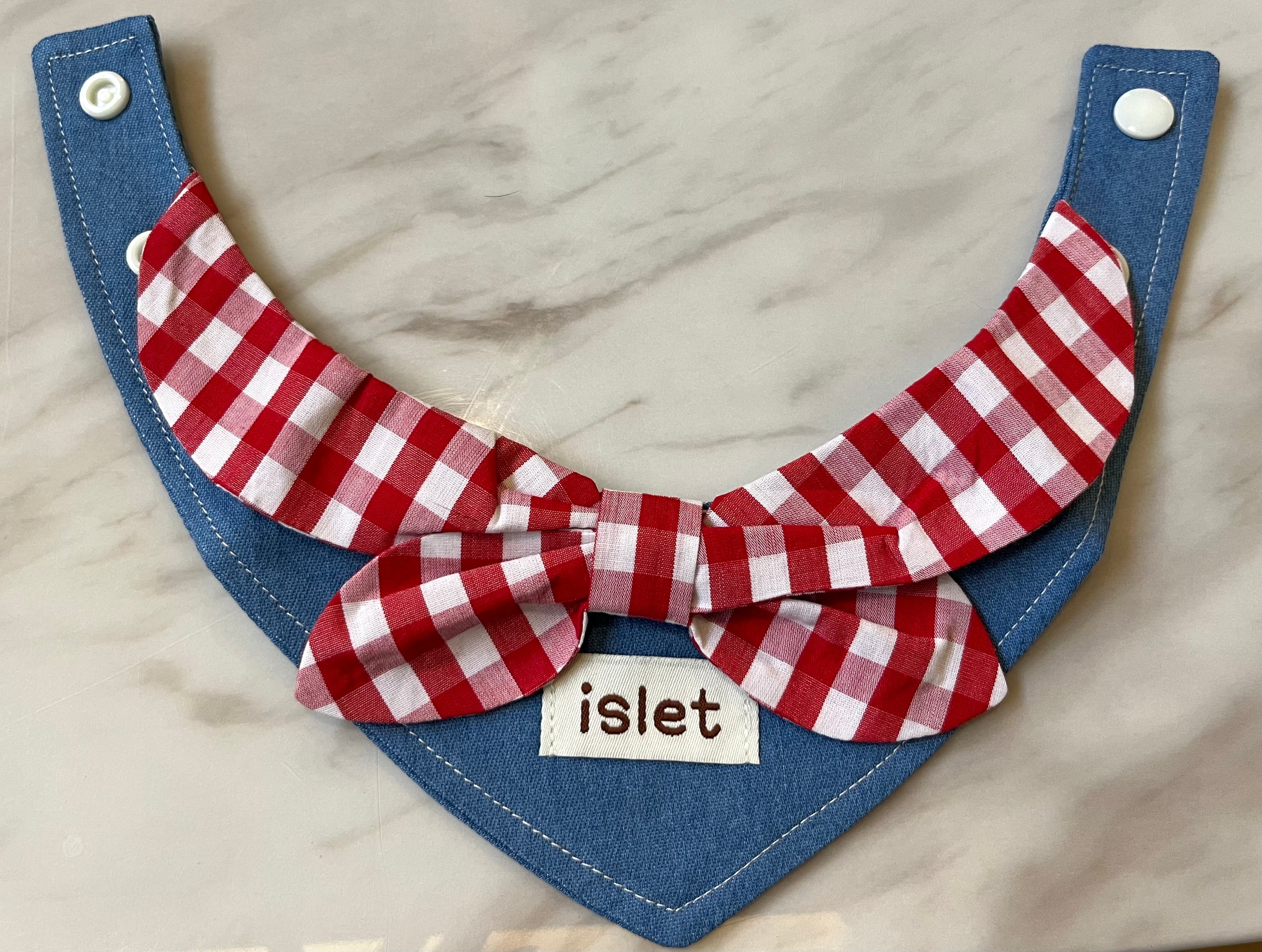 denim bib with red plaid pattern